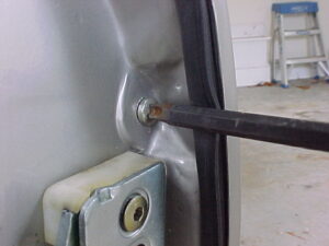 Door Handle – Removal, Installation, and Adjustment-1-door_handle_screw